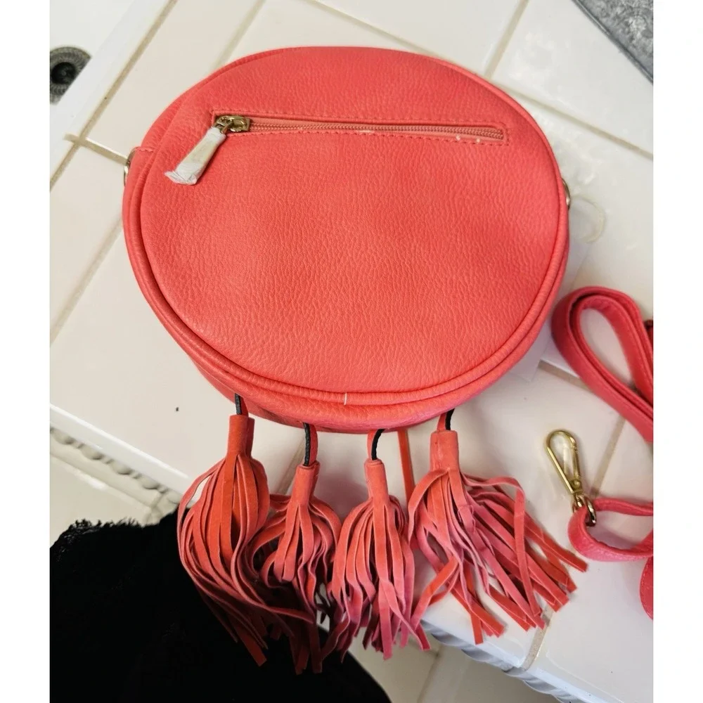 Alyssa Vegan Orange Small RoundPurse Bag with Tassels & Grommets Crossbody Strap - Picture 3 of 5